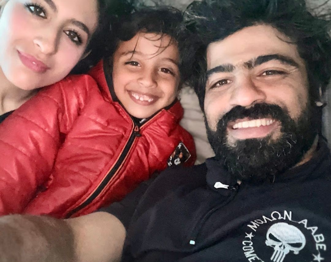 Aseel, Nabila and family smiling together